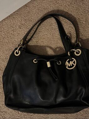 Michael Kors Black Leather Drawstring Shoulder Bag with Gold Hardware